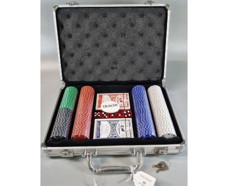 Aluminium cased poker set with poker chips, two sets of playing cards, dice etc.(B.P. 21% + VAT) 