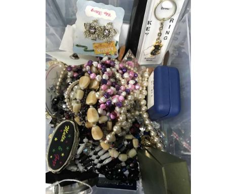 LOT OF BEADED NECKLACESand other costume jewellery, along with compact mirror and photo frame