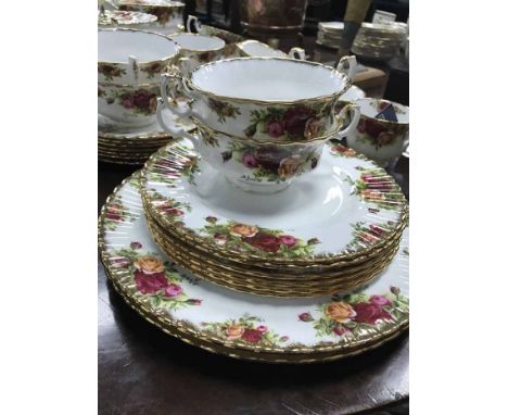 ROYAL ALBERT OLD COUNTRY ROSES TEA AND DINNER SERVICEcomprising seven cups and saucers, eight dinner plates, seven tea plates