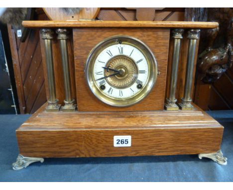 Oak brass column mantel clock 