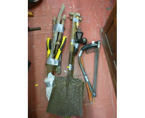 Parcel of long handled garden tools and bow saws