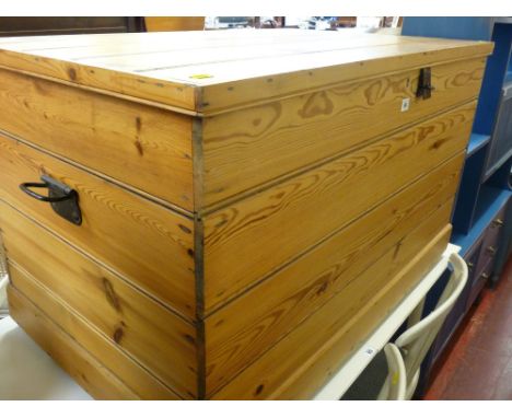Large pine trunk with metal handles