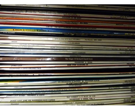Case of vintage LP records, mostly big band compilation, some classical, names include Glenn Miller, Don Williams, James Last