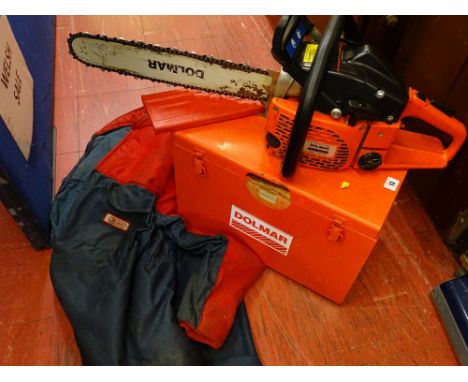 Dolmar PS-52 petrol chainsaw in metal carrybox along with Oregon chainsaw jacket