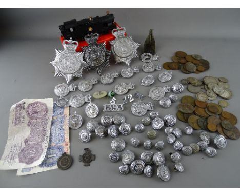 Mixed collection of Police uniform badges and buttons, selection of vintage coins and two Peppiatt bank notes, ten shillings 