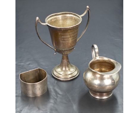 A George V silver trophy, of traditional form having personalised engraving 'Strathallan School Sports Champion 1937 Thomas M