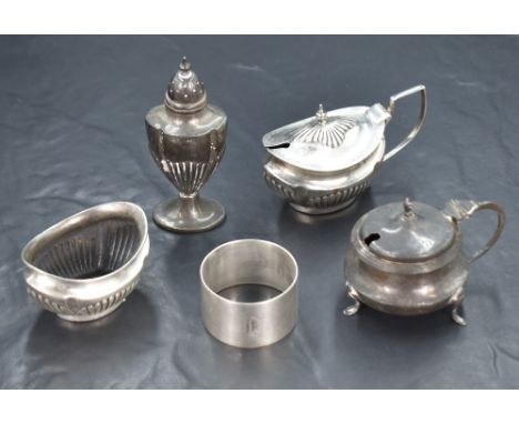 A pair of George V silver condiments, of oval form having half fluted bodies, marks for Birmingham 1919, maker John Rose, alo