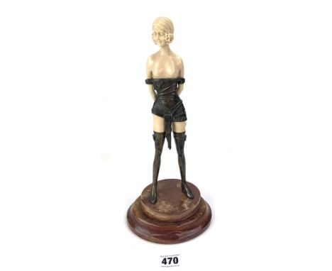 Metal &amp; resin Art Deco figure of woman with whip on onyx plinth, 13" high