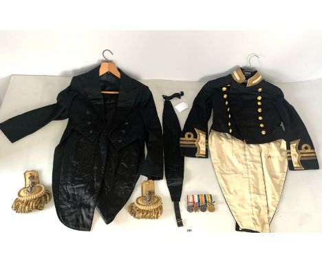 Military tailcoat with a pair of shoulder epaulettes, a black evening tail coat with cumberband and bar with 4 war medals - P