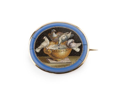A 19th century micromosaic panel brooch, the oval blue paste panel inlaid with polychrome tesserae depicting the Doves of Pli