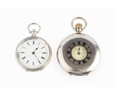 A silver half hunter pocket watch, the white dial with Roman numerals and subsidiary seconds dial, to a keyless wind movement