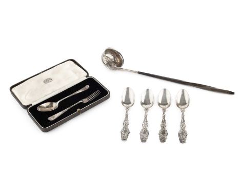 A George II silver toddy ladle, with coin inset swag decorated bowl, and whalebone twist handle, maker's mark indistinct, Lon