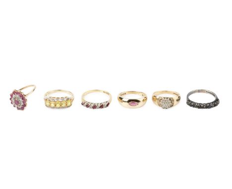 A collection of dress rings, comprising a diamond cluster ring, 9ct gold mounted, a ruby and diamond cluster ring, also 9ct g