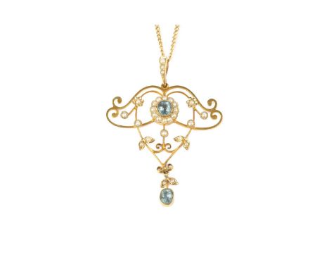 An aquamarine and half pearl pendant, the openwork scrolled panel centred with a cushion-shaped aquamarine and half pearl clu