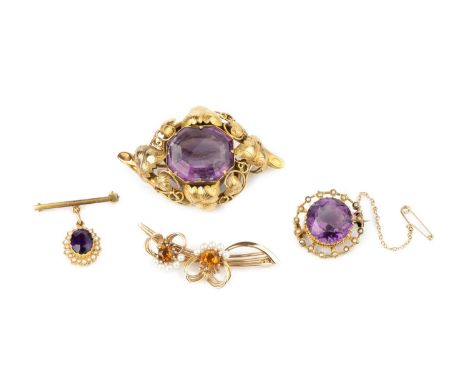 A collection of gem set brooches, comprising a Victorian amethyst single stone panel brooch, the octagonal step-cut amethyst 