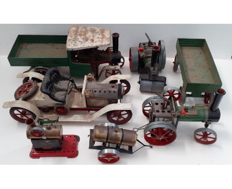A collection of Mamod steam items to include a stationary steam engine, steam roller, wagon, vintage car, steam engine and tr