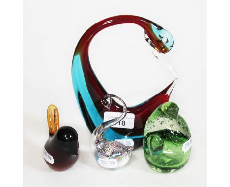 A vintage Murano glass bird, bubble glass penguin paperweight, Wedgwood glass bird and a Heron glass swan.  