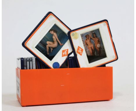 A collection of vintage photographic negatives mounted in slides depicting female nude modelsQuantity:- 28 slides