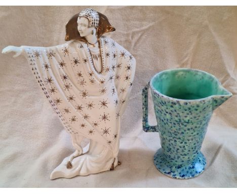 A vintage Art Deco figurine 'Joe' and a Phoenix ware 'Opal' jug/ pitcher.