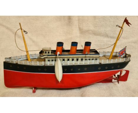 A vintage Litho tin ship.Dimensions:- Approx. 32cm long