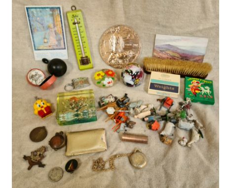 A box of collectables and militaria to include paperweights, WWI medal awarded to Pte. D. Cummings, trench art lighter, The W