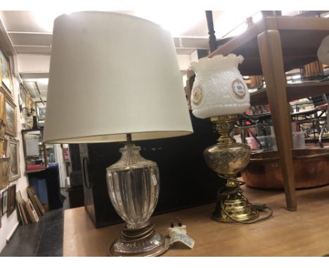 A glass table lamp and another