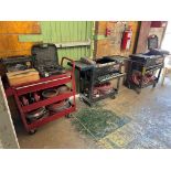 Lot of 4 pieces, contains: 3 various tool carts. Includes contents: 1 Black and Decker brand Jigsaw