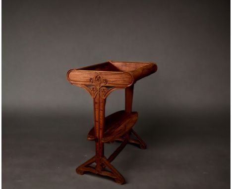 Louis MAJORELLE (1859-1926) attr. a - An Art Nouveau burr walnut veneered table with cherry blossom branch decoration on the 