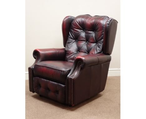 La-Z-boy wingback manual reclining armchair upholstered in buttoned ox blood leather    Condition Report   Click here for fur