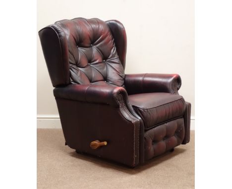 La-Z-boy wingback manual reclining armchair upholstered in buttoned ox blood leather    Condition Report   Click here for fur