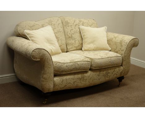 Two seat sofa (W170cm), and matching armchair (W90cm), upholstered in beige fabric