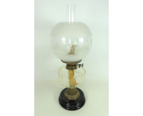 Victorian brass oil lamp with clear glass reservoir and opaque shade, H54cm    Condition Report   Click here for further imag