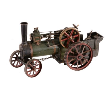  An approximate 3/4 inch to the foot model of an agricultural Traction Engine, having single flue boiler being spirit fired w