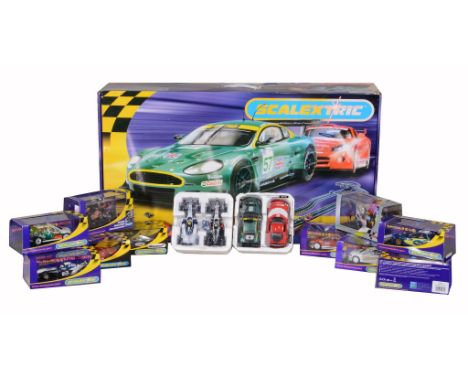  A Scalextric Collection, to include a boxed GT Racer set, sundry track and accessories including a race timer. A collection 