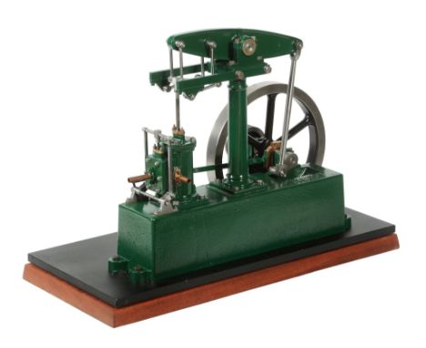  A Stuart Turner model beam engine, having central turned column supporting beam with Watt s parallel action to single vertic