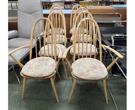 A set of eight Ercol hoop and stick back dining chairs with removeable seat cushions