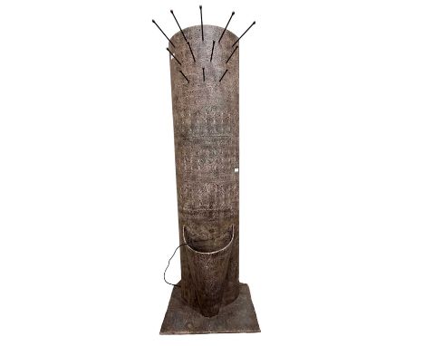 A modern combination coat and stick stand formed of textured iron of curved form with illuminated back, 175cm high