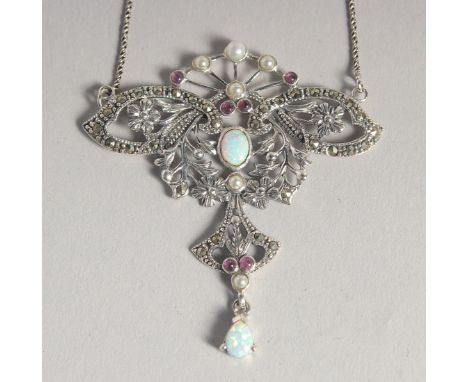 A SILVER OPAL AND RUBY NECKLACE.