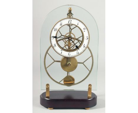 AN OPEN FACE GLASS CLOCK on a marble base. 14ins high.