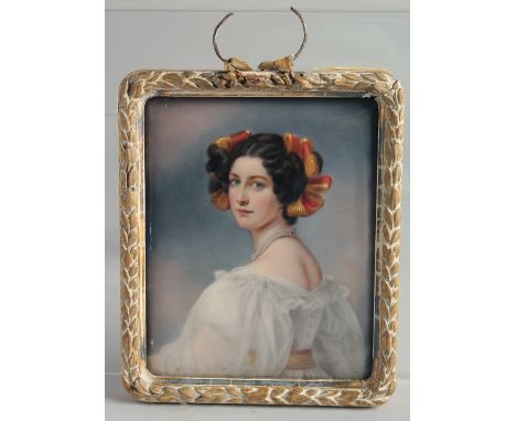 A VERY GOOD CONTINENTAL PORCELAIN PORTRAIT PLAQUE. Half-length of a young lady. 6ins x 9ins in a gilt frame.