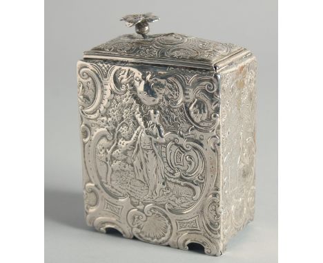 A DUTCH SILVER TEA CADDY with a sliding cover, repousse with figures and scrolls. English Imperial mark, 1902.