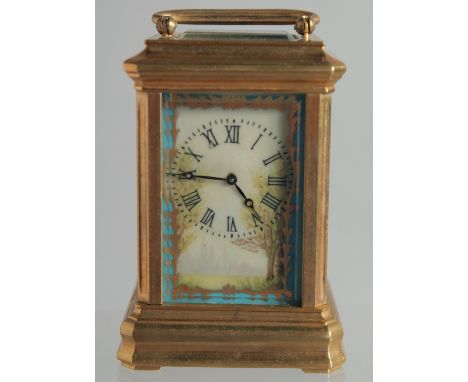 A SEVRES MINI BRASS CARRIAGE CLOCK with porcelain panels. 3ins high.