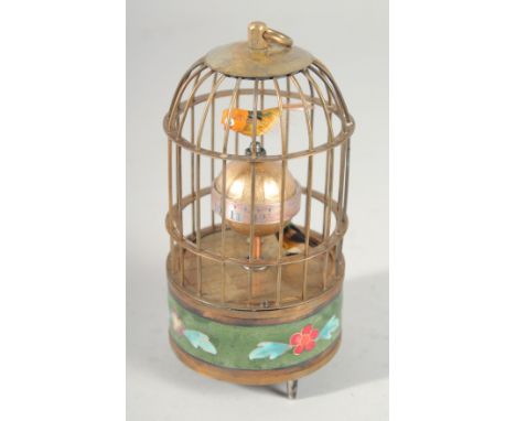 A SMALL CLOISONNE BIRD CAGE CLOCK 5.5ins high.