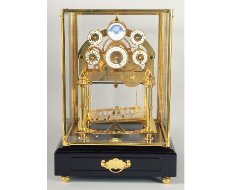 A GOOD MOONPHASE CONGREAVE ROLLING BALL CLOCK in a glass case. 12ins high.