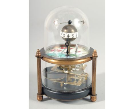A SMALL GLASS DOMED FISH CLOCK. 5ins high.