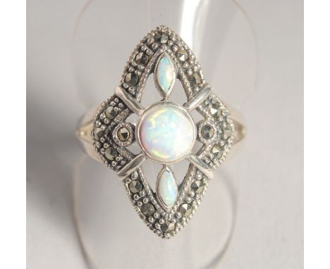 A SILVER MARCASITE AND GILSON OPAL RING.