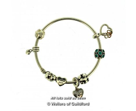 *Pandora bangle with heart clasp and seven charms/spacers (two non-Pandora) (Lot subject to VAT)