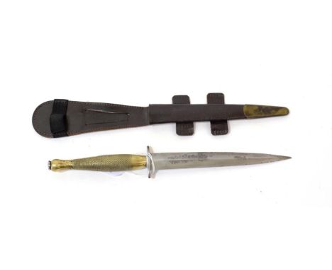 A Second World War Second Pattern Commando Knife, (possibly India issue), the 17.5cm double edge hand forged steel blade unma