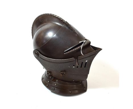 A Copy of a 16th Century Close Helmet, with gadrooned decoration to the shallow comb and eye slits, the right side with hook 