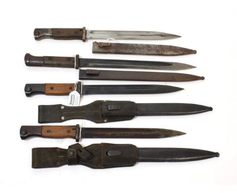 Three German Third Reich Model 1884/98 Knife Bayonets, each with waffenampt markings to the hilts, two with blued steel scabb